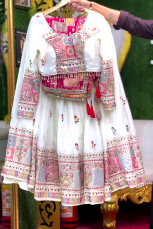 Traditional White and Multicolor Embroidered Mirror Work Lehenga Choli Set with Full Sleeve Blouse, Heavy Thread and Zari Detailing, Tassel Accents, and Matching Dupatta – Ideal for Navratri, Festive Celebrations, and Cultural Events