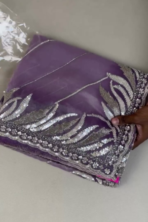 Elegant Purple Designer Net Saree with Intricate Silver Sequin Embroidery, Floral and Leaf Border Detailing, and Matching Unstitched Blouse Piece – Perfect for Weddings, Parties, and Festive Occasions